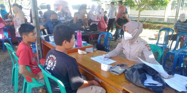 GERAKAN SERENTAK VAKSINASI COVID-19 DI KANTOR CAMAT ILIR TALO