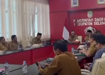 KASUBBAG UKK DINAS KESEHATAN SELUMA HADIRI RAPAT PEMANFAATAN BMD BAGI KOPERASI DESA/KELURAHAN MERAH PUTIH