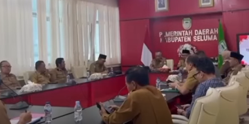KASUBBAG UKK DINAS KESEHATAN SELUMA HADIRI RAPAT PEMANFAATAN BMD BAGI KOPERASI DESA/KELURAHAN MERAH PUTIH